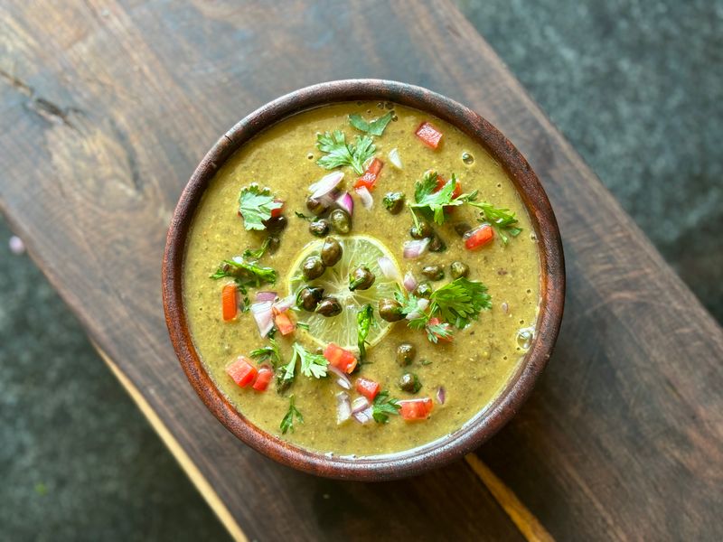 Spiced red lentil soup with cumin and cilantro