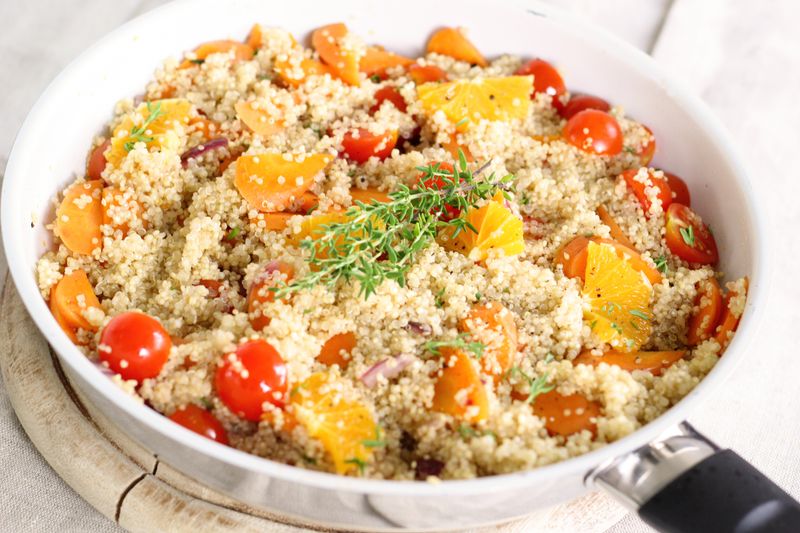 Grain and greens bowl with quinoa and fresh vegetables